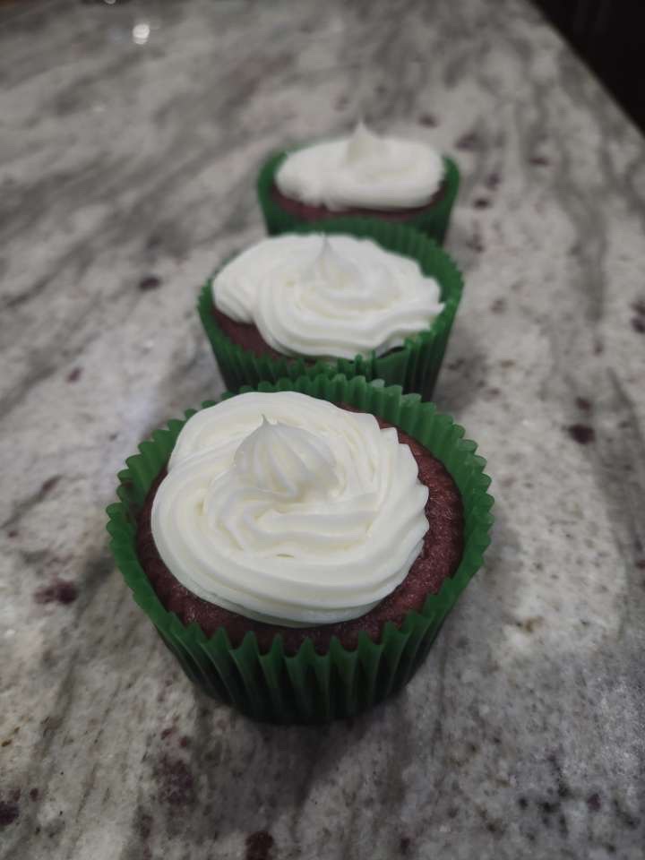 Red velvet cupcakes with white frosting
